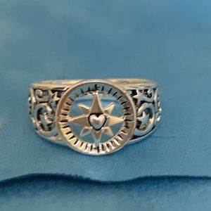 Silver sundial  & star design ring